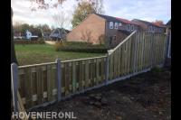 Hout beton schutting met hoogteverschil