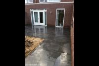 Achtertuin bestraten