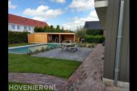 Tuinaanleg met bouwkundig zwembad, bestrating en graszoden