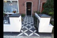 Moderne onderhoudsarme voortuin met sierhekwerk 3