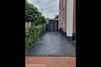 Oprit bestraten met betonklinkers