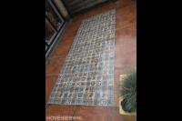 Sierbestrating met mozaïektegels