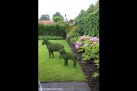 Groene tuindecoratie in vorm van schapen