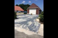 Oprit aanleggen met antraciet klinkers