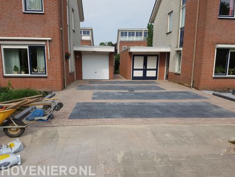 Opritten bestraten met klinkers en betontegels