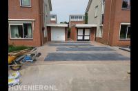 Opritten bestraten met klinkers en betontegels