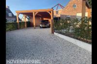Oprit van grind en houten pergola