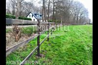Houten omheining rond weiland