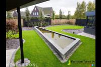 Tuinaanleg met strakke vijver en gazon