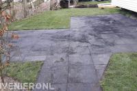 Tuinaanleg met betontegels en graszoden