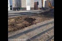 Verhoogd terras met trap aanleggen