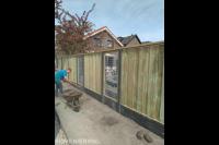 Hout beton schutting met schermen van betongaas