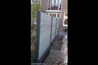 Hout beton schutting plaatsen