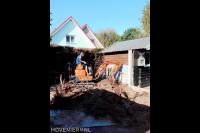 Tuin leeghalen met minikraan