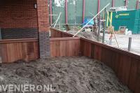 Houten beschoeiing plaatsen
