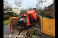 Rupsdumper legen in container