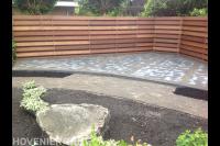 Zithoek bij houten schutting