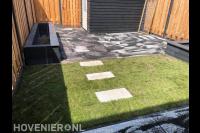 Tuinaanleg met bestrating, plantenbakken en graszoden