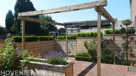 Houten pergola met harmonicadoek