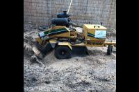 Boomstronk verwijderen met stobbenfrees