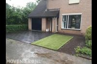 Onderhoudsarme voortuin met bestrating en kunstgras